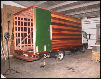 Superstructure de véhicule utilitaire entièrement réalisée en bois